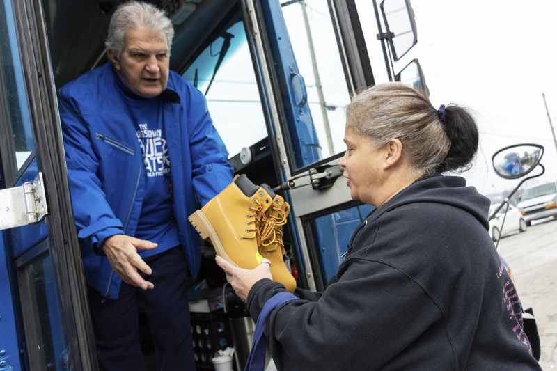Crossing borders to help: Youngstown Blue Coats distribute winter wear in Farrell